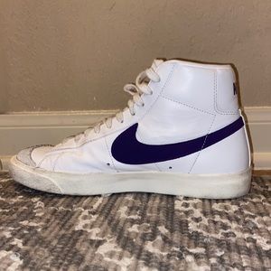 Nike blazers with a purple swoosh